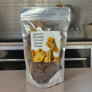 Chocolate Covered Peanut Brittle bag on kitchen countertop